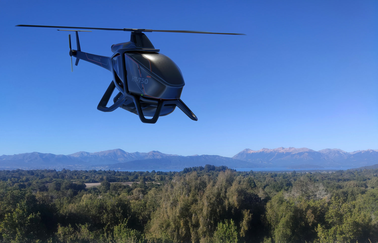 The HT-750 and an attached heavy cargo payload is shown flying over a landscape with trees and mountains in the background.