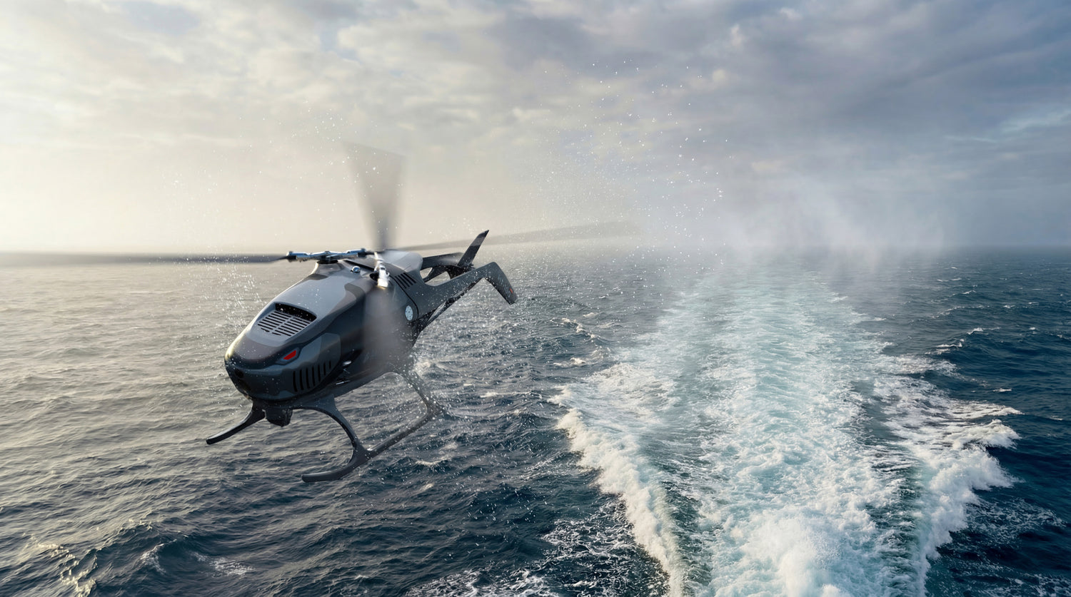 HT-100 helicopter flying over a body of water with a clear sky.
